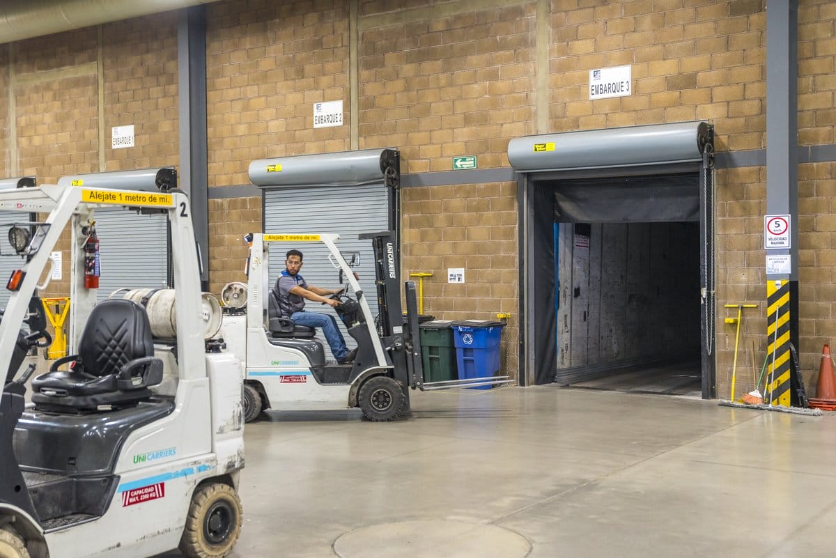 A forklift operator loads an export shipment at a Tetakawi Manufacturing Campus loading dock in Mexico | Tetakawi
