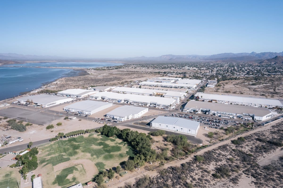 Aerial view of an industrial park with multiple leasable warehouse buildings in Sonora, Mexico | Tetakawi