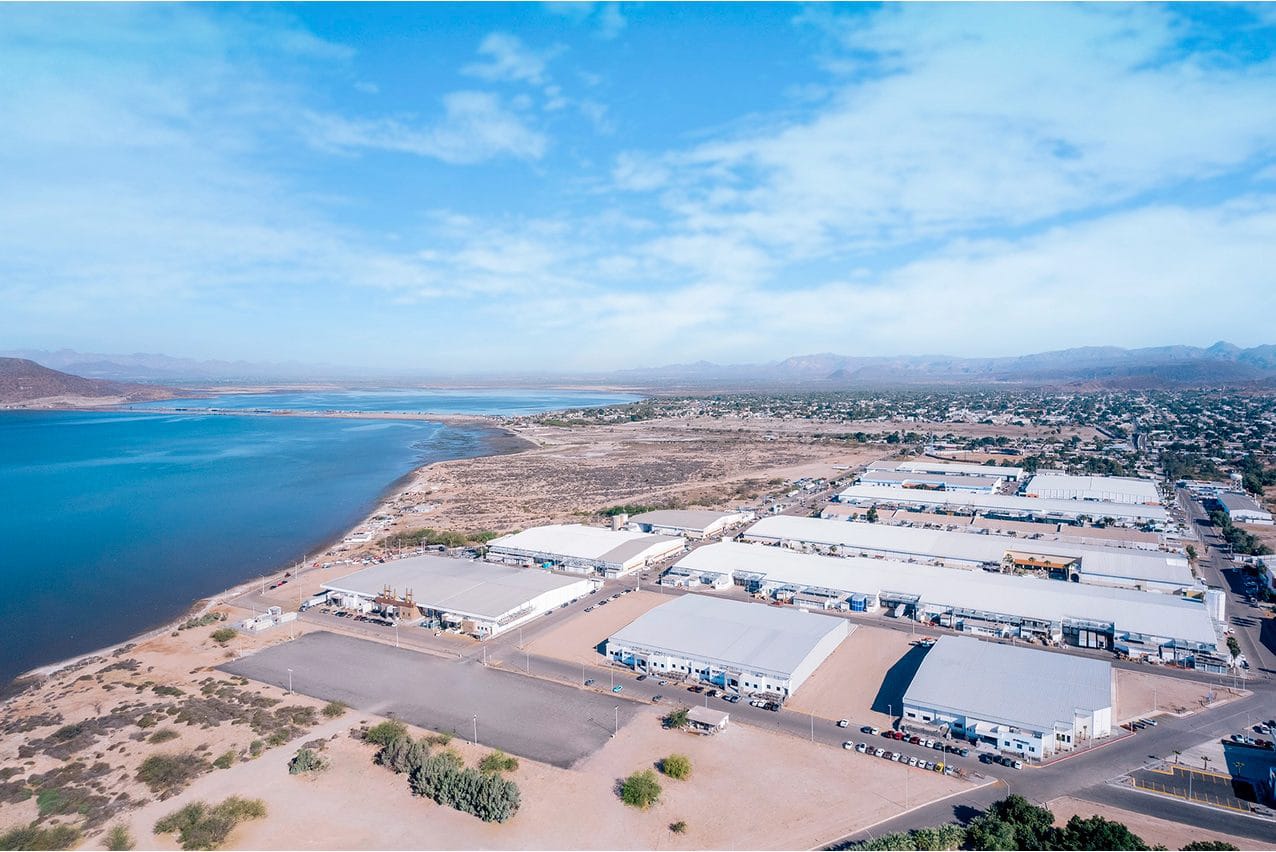 Aerial view of the Bella Vista Manufacturing Campus buildings along the coast in Empalme, Sonora, Mexico | Tetakawi