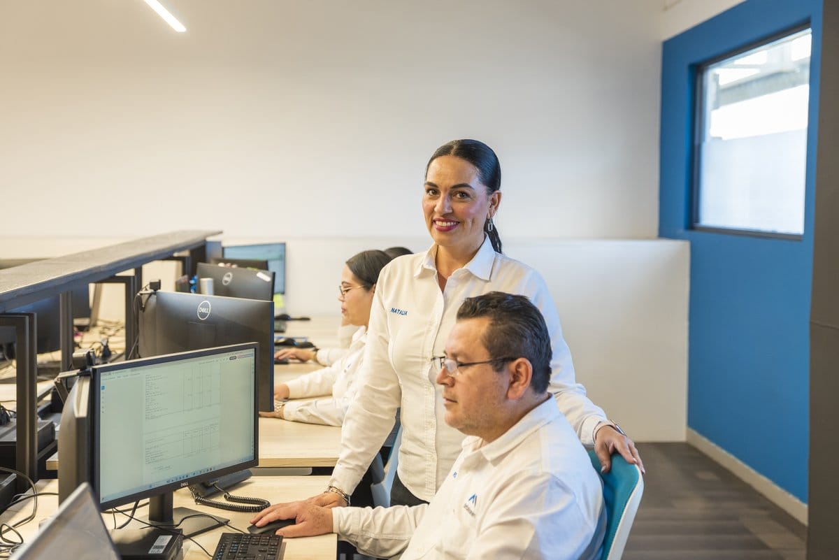 Tetakawi administrative staff supporting IMMEX compliance for manufacturing communities in Mexico | Tetakawi