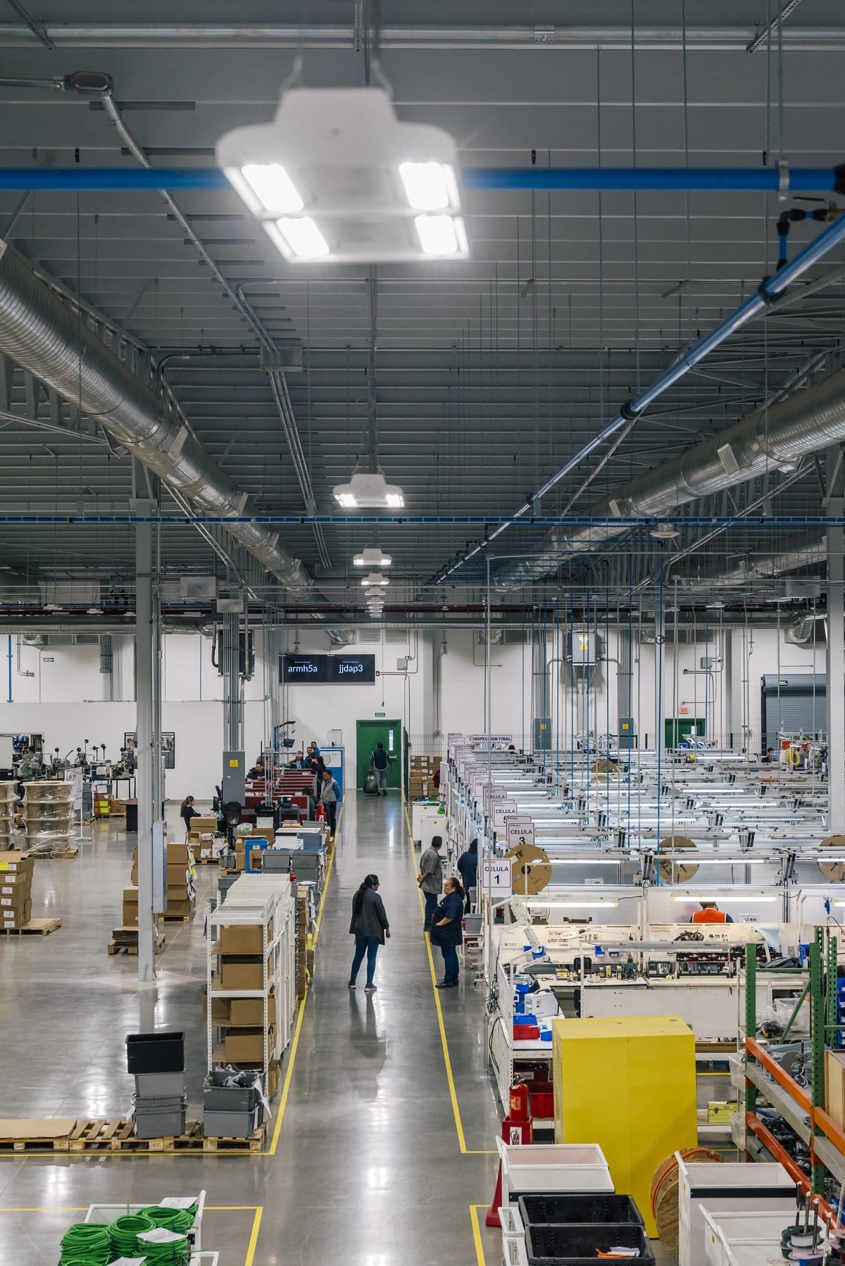 Wide view of a Tetakawi Manufacturing Campus production floor in Mexico, the facility scale behind real cost data | Tetakawi