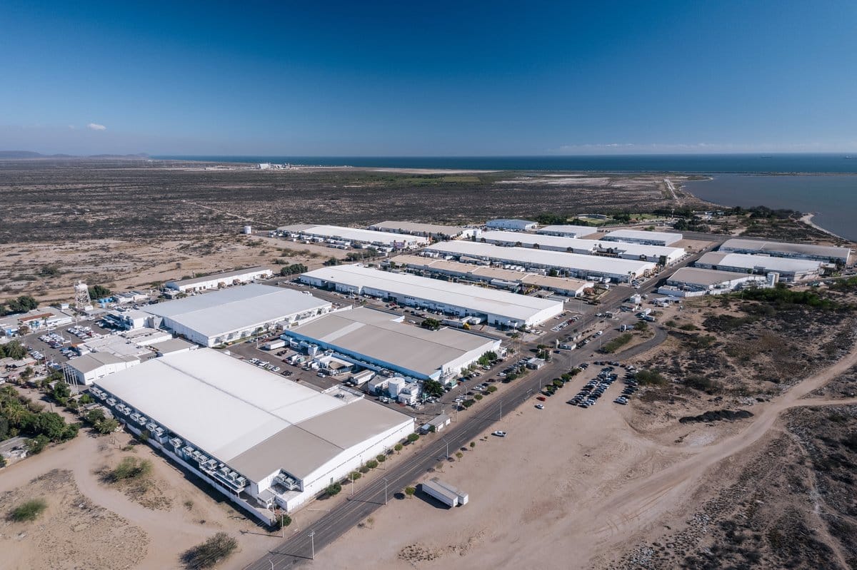 Aerial view of a large-scale Tetakawi Manufacturing Campus on the Guaymas coast in Mexico | Tetakawi