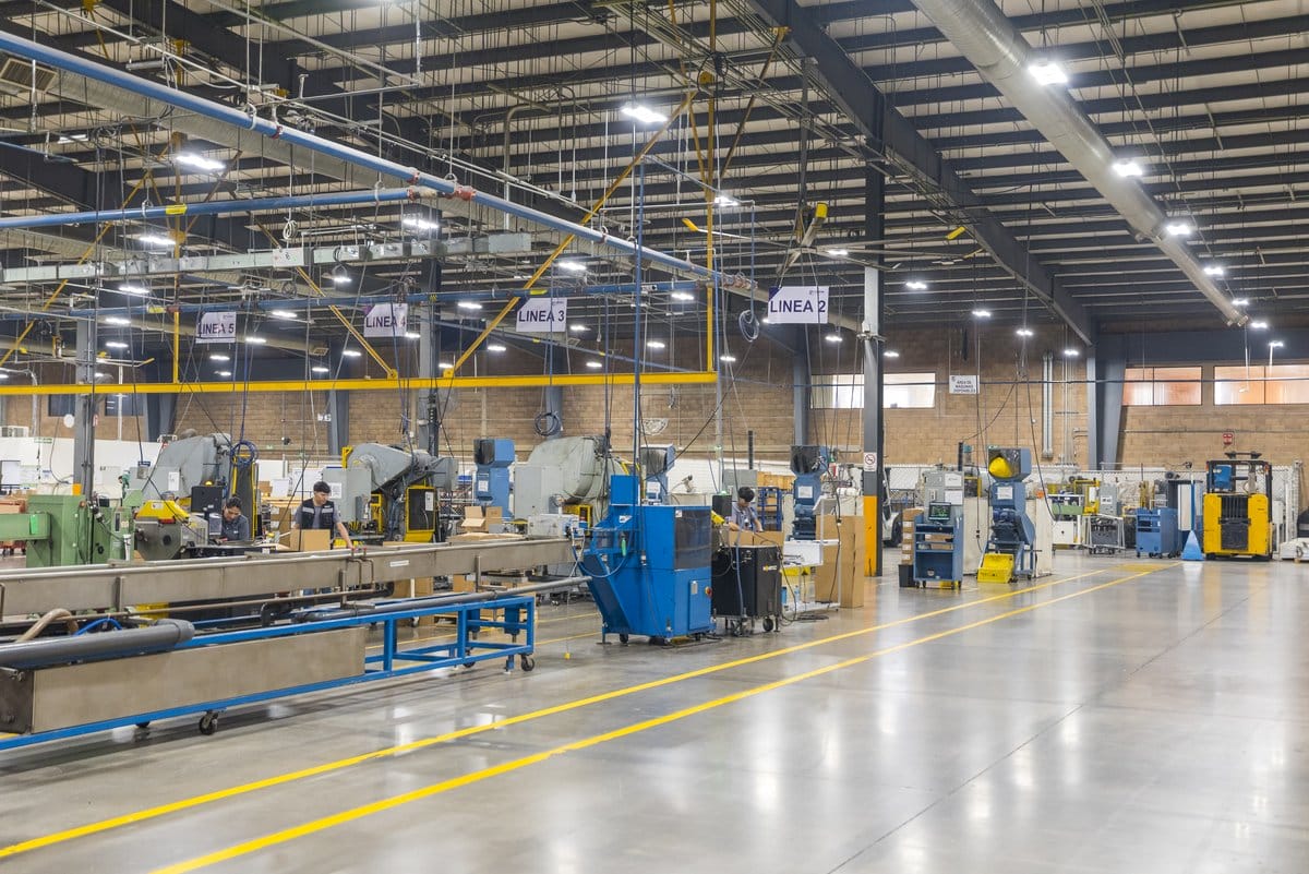 Active production lines inside a Tetakawi Manufacturing Campus, an IMMEX-registered maquiladora operation | Tetakawi