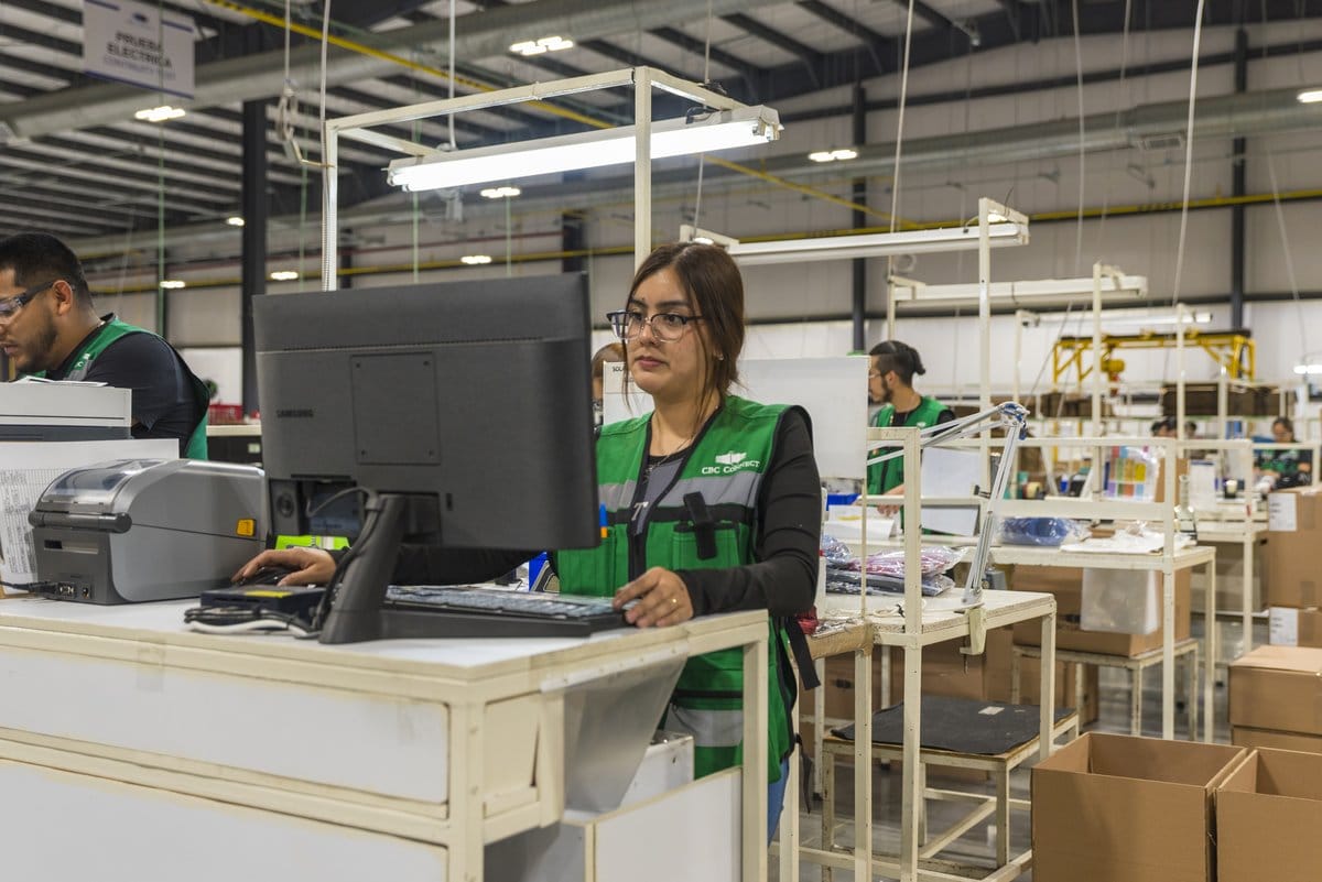 A technician monitors quality-control testing at a Tetakawi Manufacturing Campus in Mexico | Tetakawi