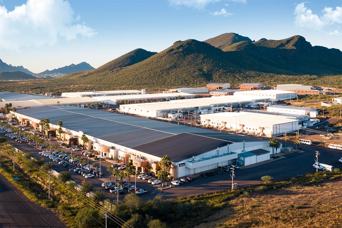 Aerial view of the Roca Fuerte Manufacturing Campus industrial buildings below the hills of Guaymas, Sonora | Tetakawi