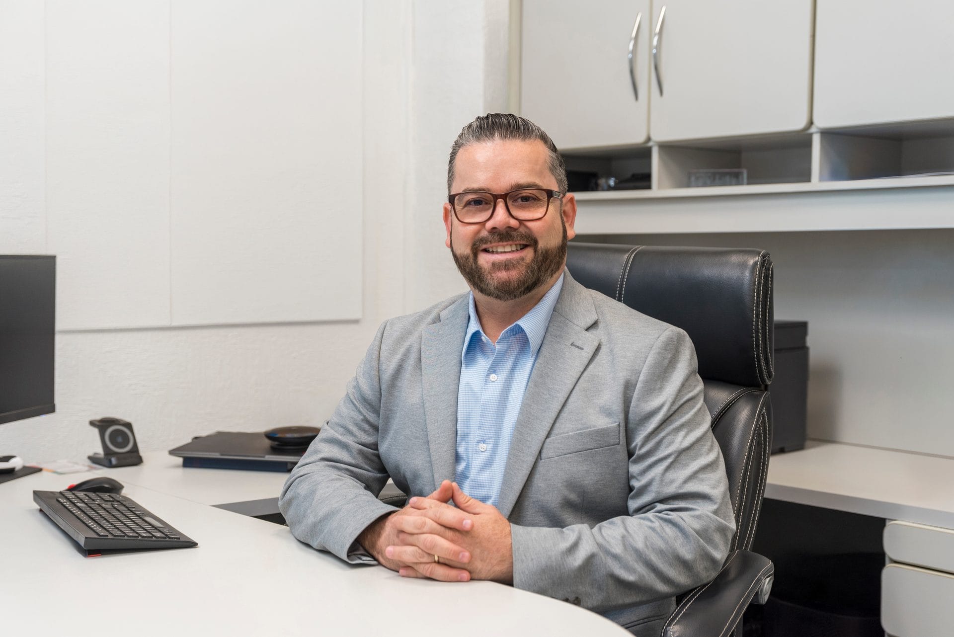 Marco Lopez of Intec Group seated at his office desk on the Roca Fuerte Campus in Guaymas, Mexico | Tetakawi