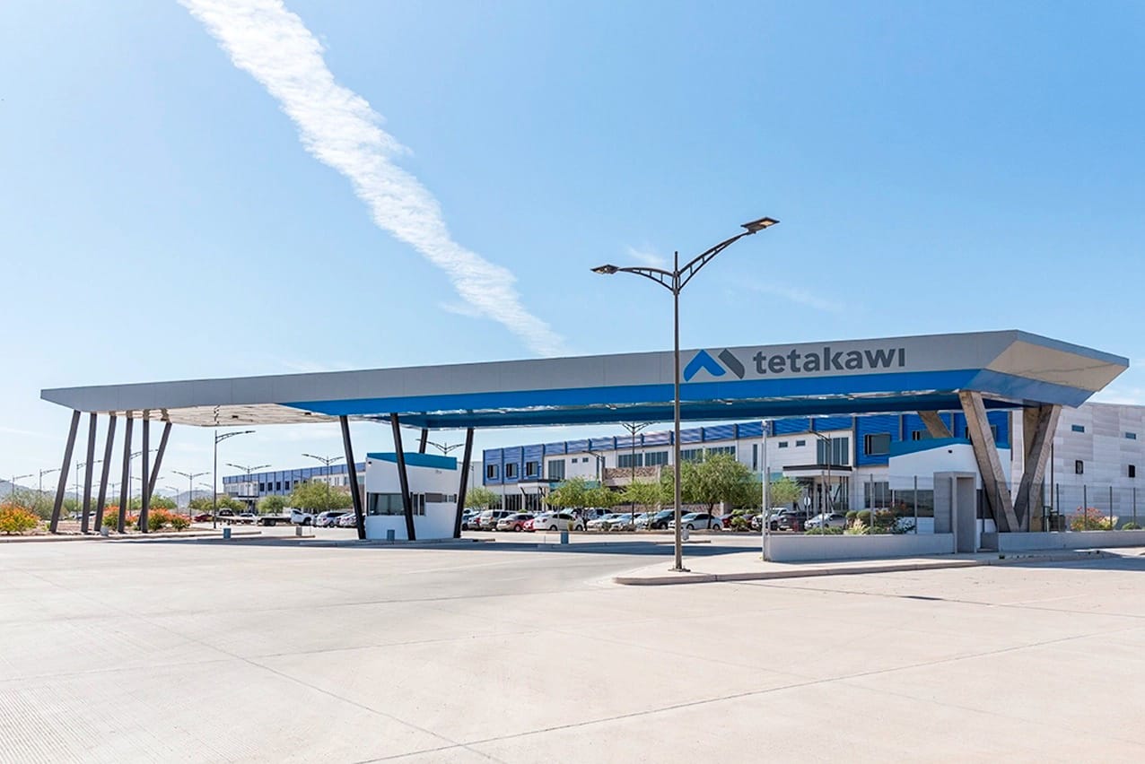 Tetakawi-branded entrance canopy and gatehouse at the Rio Sonora Manufacturing Campus in Hermosillo, Mexico | Tetakawi
