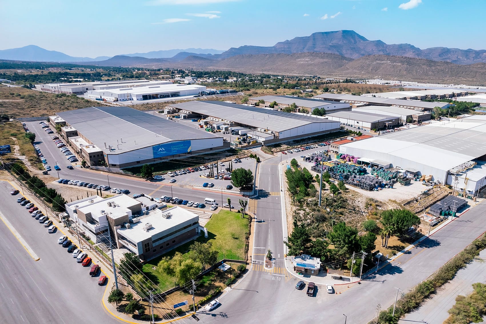 Aerial view of the Zapa Manufacturing Campus industrial buildings and entrance road in Saltillo, Mexico | Tetakawi