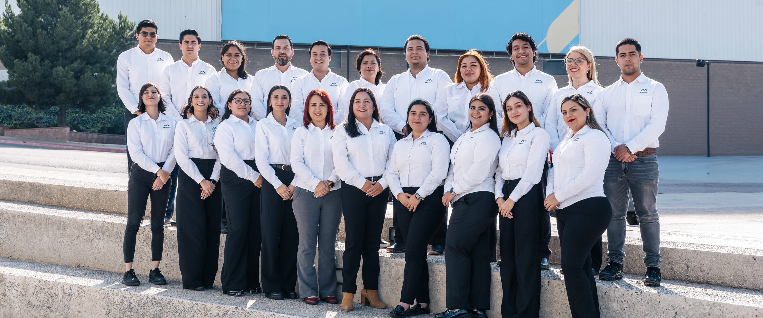 Tetakawi team members gathered outside the Zapa Manufacturing Campus in Saltillo, Mexico